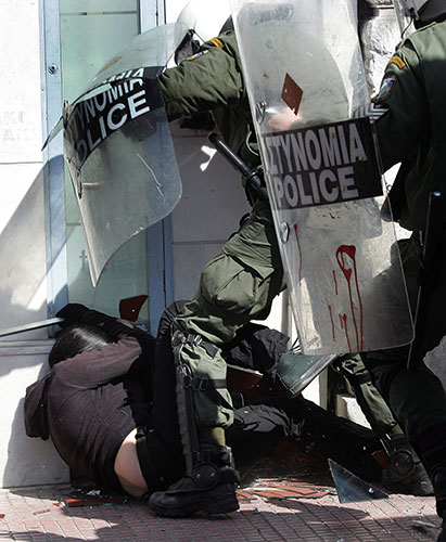 more strikes in greece: Protestors clash with riot police during a demonstration in central Athens