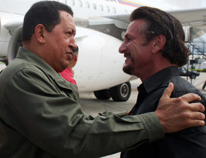 President Hugo Chavez  talks with Sean Penn in Venezuela