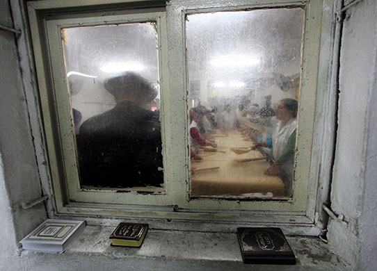 24 hours in pictures: Ultra Orthodox Jews Making Matzo for Passover Holiday