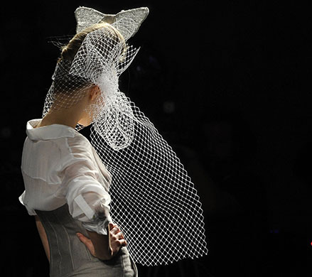 24 hours in pictures: A model presents a creation by Spanish designer Pablo Y Mayaya, Spain