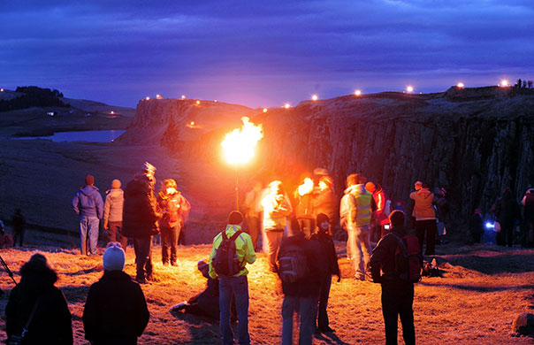 Hadrian's Wall: Hadrian's Wall is lit from end to end by a team of 500 volunteers