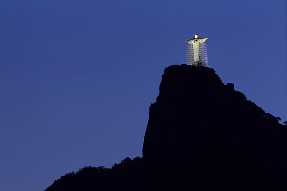 24 hours: Rio de Janeiro, Brazil: The statue of Christ is surrounded by scaffolding