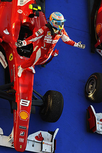 Bahrain Grand Prix: Fernando Alonso of Spain and Ferrari celebrates in Parc ferme after winning