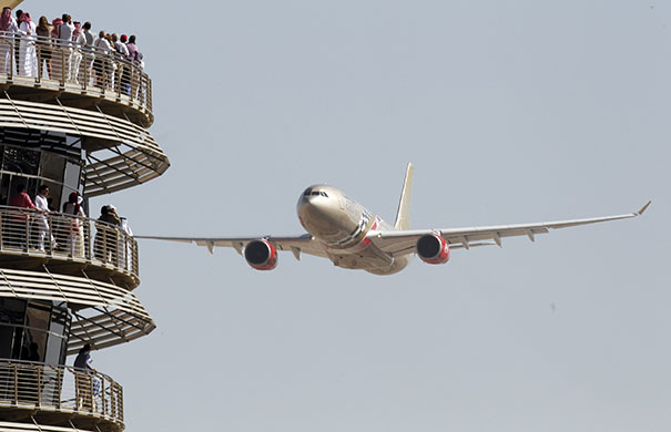 Bahrain Grand Prix: A Gulf Air plane flies ceremonially past the VIP tower