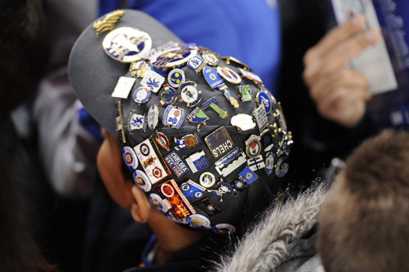 Chelsea v Inter: A young Chelsea fan displays his impressive collection of badges