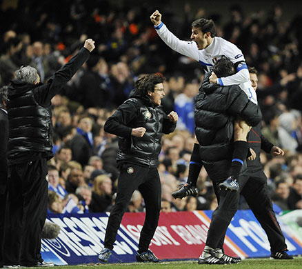 Chelsea v Inter: Javier Zanetti leaps into a coach's arms as he celebrates Inter's goal