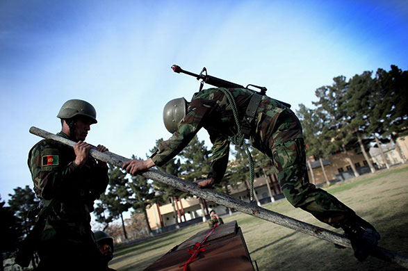 24 hours in pictures: Afghanistan National Army Graduation Ceremony