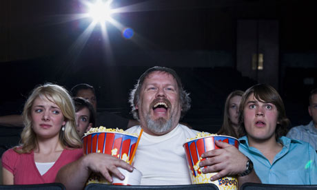 Cinemagoers Enjoying Concessions