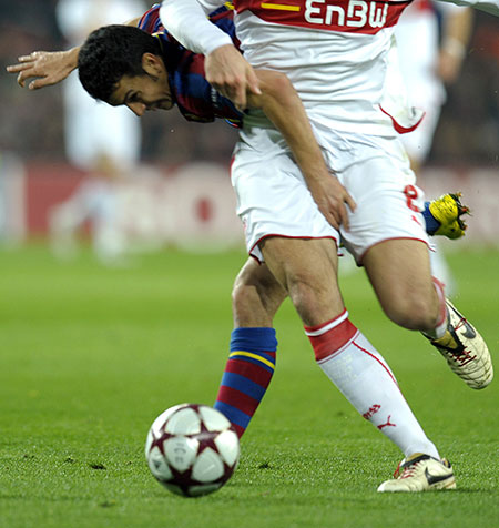 Champions League: Barcelona's Pedro Rodriguez tackles Stuttgart's Cristian Molinaro