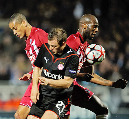 Champions League: Olympiakos' Avraam Papadopoulos, Bordeaux's Michael Ciani and Wendel 