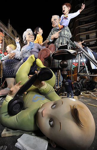 Las Fallas in Valencia: Painters work on a Falla Las Fallas in Valencia