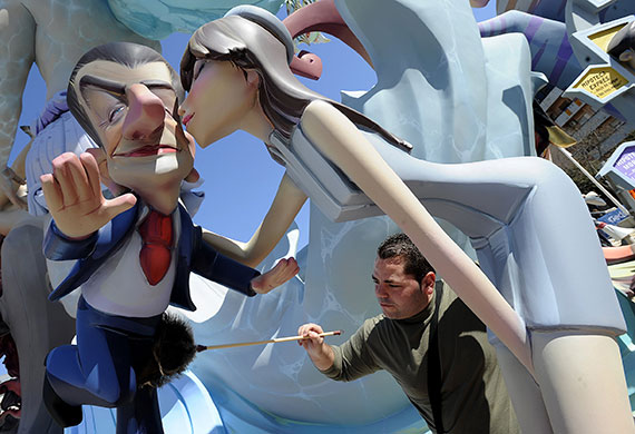 Las Fallas in Valencia: Las Fallas Festival Valencia A painter works on a Falla