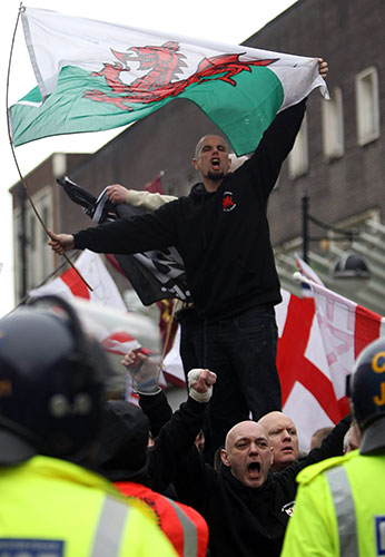 EDF march in Bolton: Members of The English Defence Leaguewave flags and shout slogans