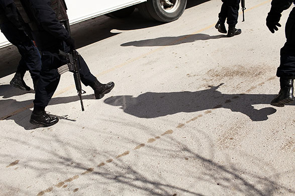 24 hours in pictures: mexican drug war fuels violence in juarez