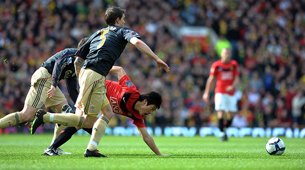 Liverpool v Man Utd: Park Ji-Sung is tackled