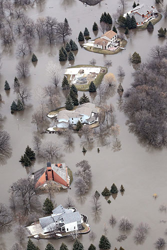 24 hours in pictures: Red River Flooding Threatens Fargo For Second Consecutive Year