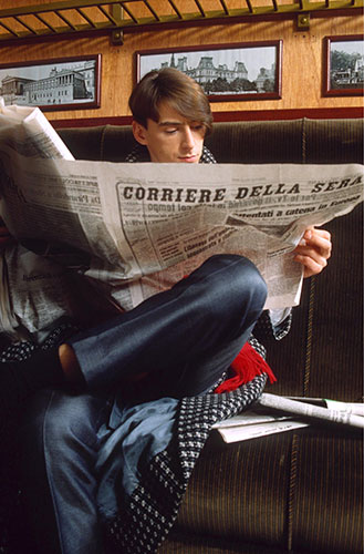 Paul Weller Timeline: Paul Weller of The Style Council reading an Italian newspaper