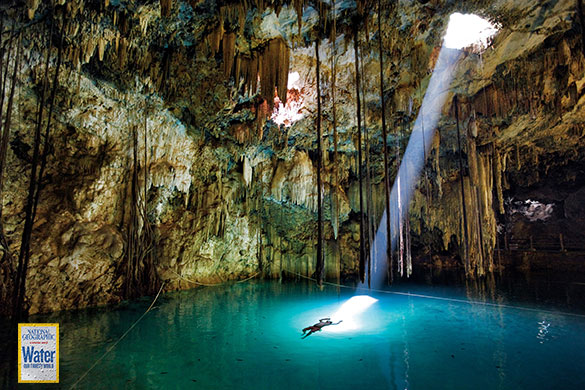 eye: Natural well Xkekén cenote, Yucatan, Mexico