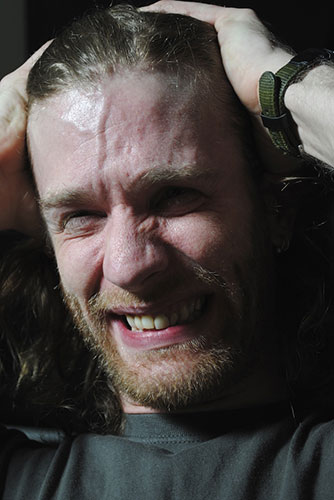 Unemployment : Stressed young man