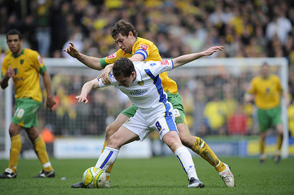 Norwich v Leeds: Grant Holt tangles with Neil Kilkenny