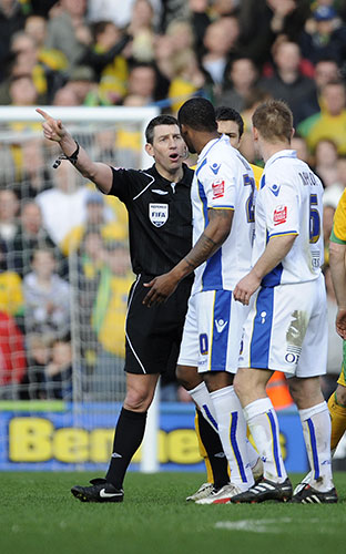Norwich v Leeds: Tresor Kandol is sent off by referee Lee Probert