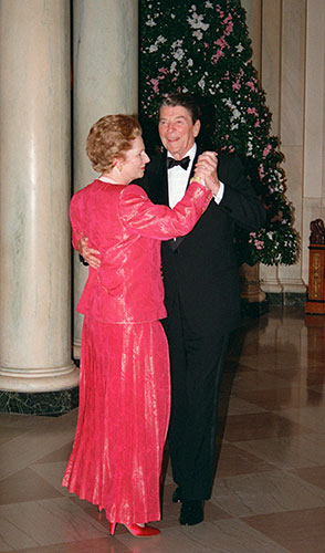 UK and US: Prime Minister Margaret Thatcher dances with President Ronald Reagan