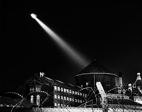 Strangeways riots: A police helicopter hovers over Strangeways prison