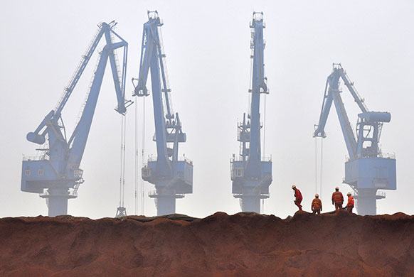24 hours in pictures: Tianjin, China: Imported iron ore from Australia