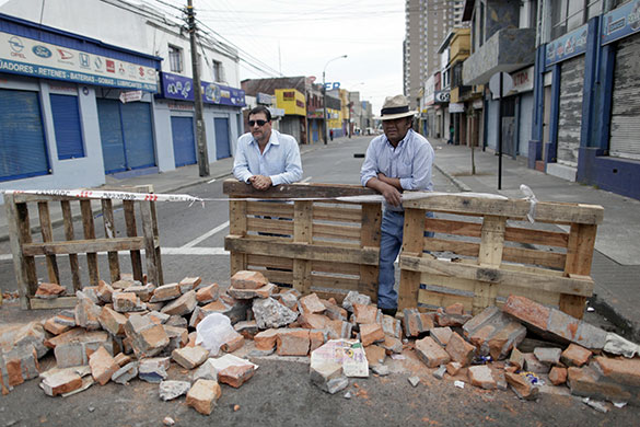 Chile security: Residents guard their block from looters in Concepcion, Chile