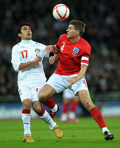 England v Egypt: Ahmed Hassan and Steven Gerrarrd tussle for the ball