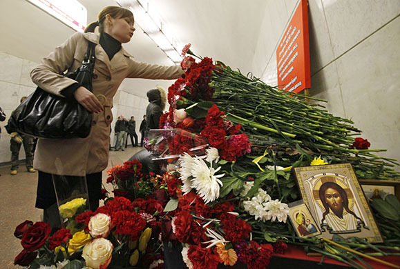 moscow bombs aftermath: Flowers, candles and icons at the sight of the bombing in Lubyanka station