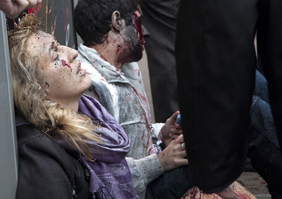 moscow bombs aftermath: Injured passengers outside Park Kultury station wait for medical care 