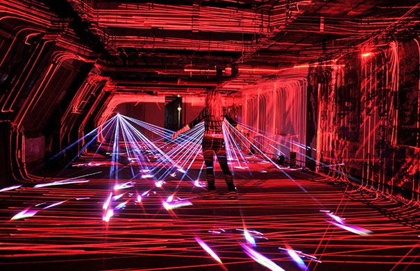 24 hours in pictures: London , UK: A young lady stands and admires the 'Speed of Light' artwork