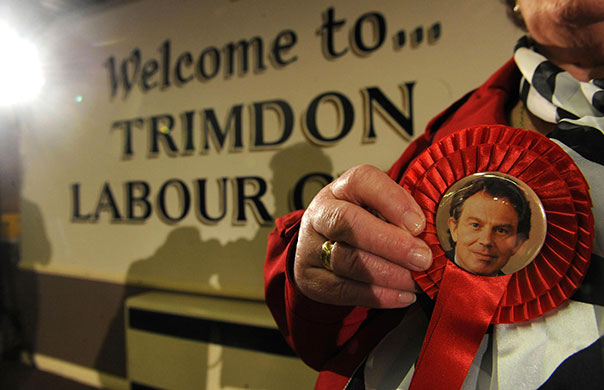 Tony Blair at Trimdon: A party member holds a rosette of former Prime Minister Tony Blair