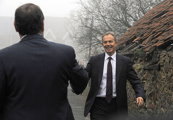 Tony Blair at Trimdon: Tony Blair smiles as he is greeted by Labour MP for Sedgefield Phil Wilson