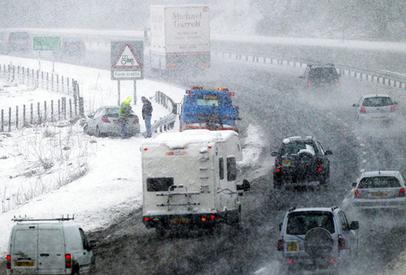 Spring snow: A car stuck in snow at the side of the A9  in Perthshire