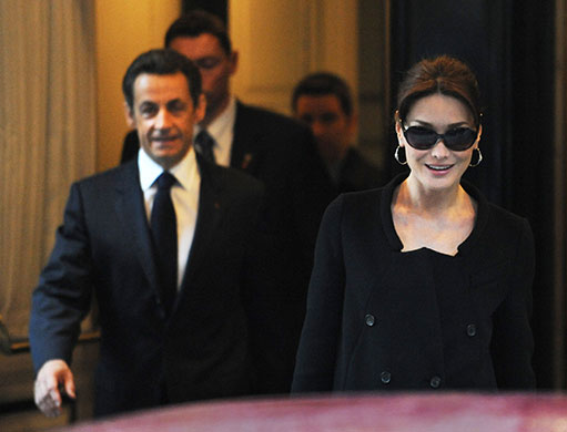 Sarkozy in the US: Nicolas Sarkozy and his wife Carla Bruni leave their Manhattan hotel 