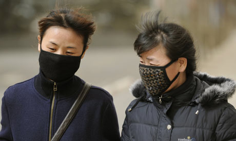 Two women wearing facemasks, China