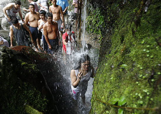 24 hours in pictures: Quezon province, Philippines: A religious devotee