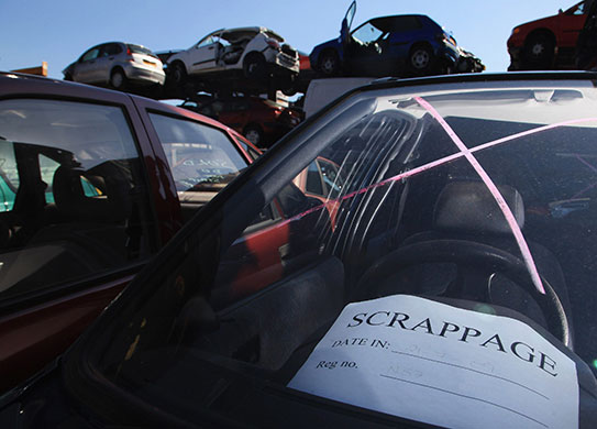 Week in Business: Cars are stacked awaiting dismantling and recycling in Gloucester