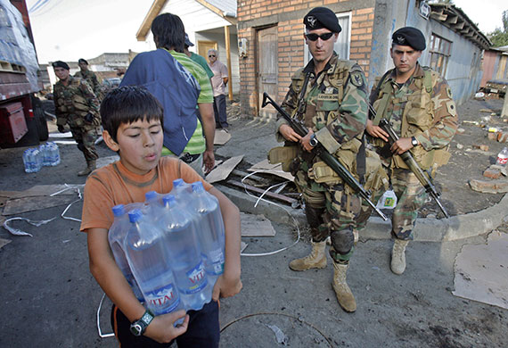 Chile Aid: Chilean Army distributes water bottles in Talcahuano, Chile 