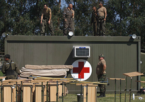 Chile Aid: March 3, 2010: Military personnel set up a field hospital in Chile