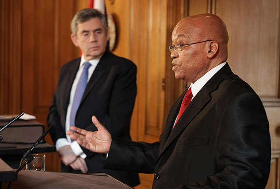 Zuma visits UK: Jacob Zuma talks to reporters as Gordon Brown looks on inside Number 10