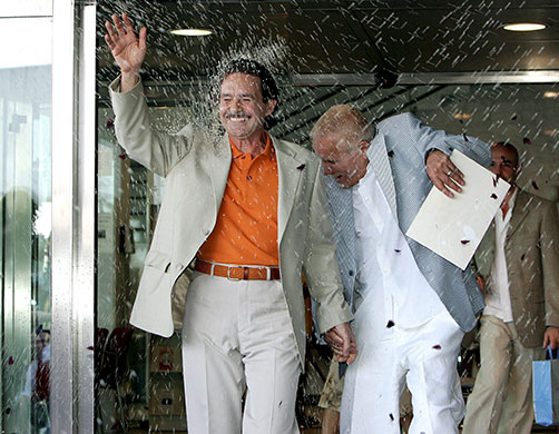 Gay weddings: Carlos, right, and Emilio in the first gay wedding in Spain