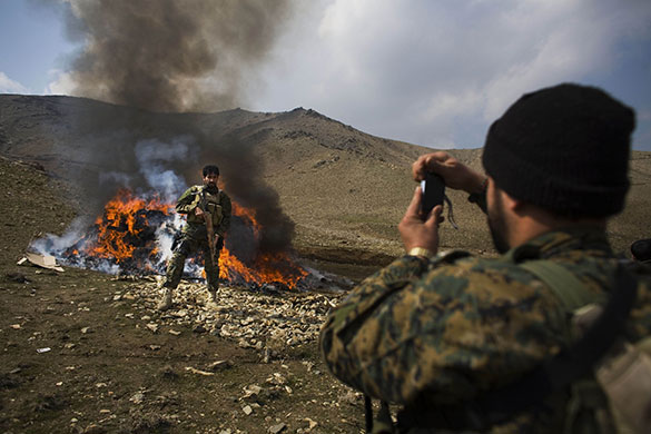 24 hours in pictures: burning seized narcotics in Afghanistan 