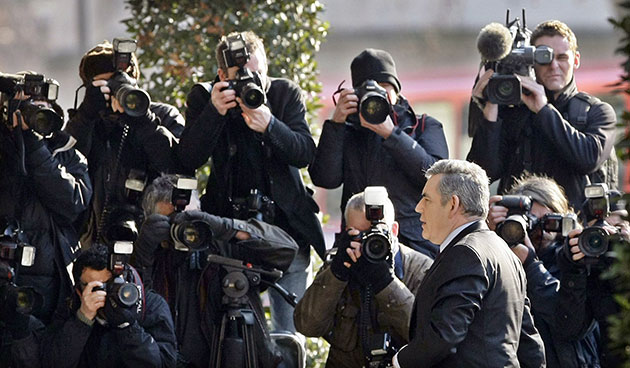 Iraq Inquiry: Photographers focus on Prime Minister Gordon Brown as he arrives