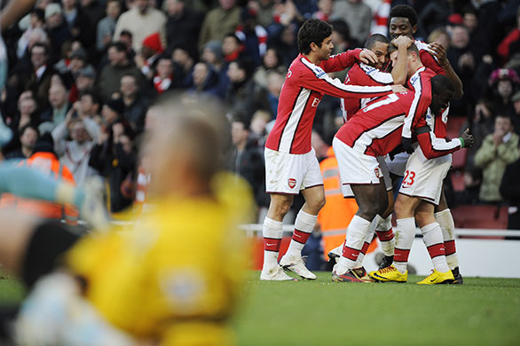 Arsenal v Burnley: Arshavin is congratulated by his team-mates after he scores Arsenal's third