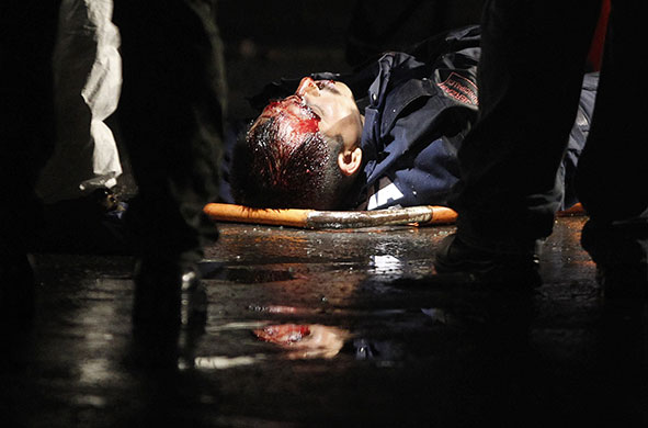 24 hours in pictures: San Nicolas de los Garza, Mexico: The body of a policeman