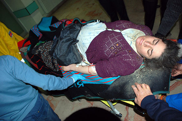 Turkey earthquake: An injured woman is carried away for treatment
