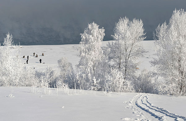 24 hours in pictures: Novosibirsk, Russia: People ice-fish on the Ob River in Siberia